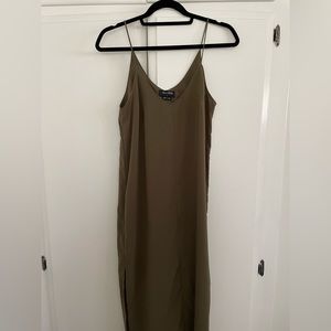 Used dark olive green dress with straps. Size small